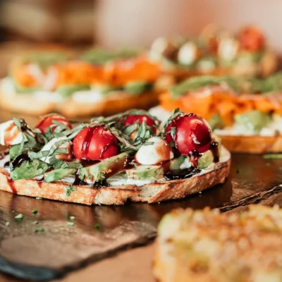 Avocado and cherry tomato bruschetta with balsamic glaze served at Bistro 1969