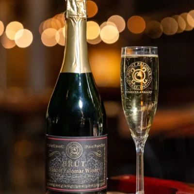 Brut sparkling wine bottle and glass served at Bistro 1969 restaurant