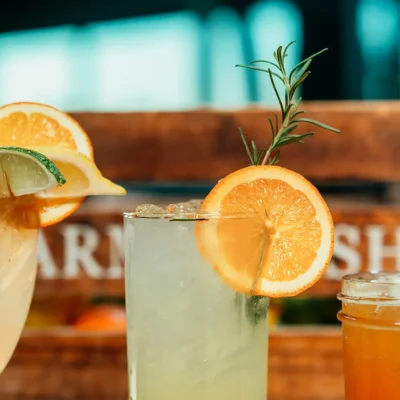 Fresh citrus cocktails with orange and lime garnish served at Bistro 1969